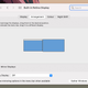 Configuring two displays via macOS System Preferences.